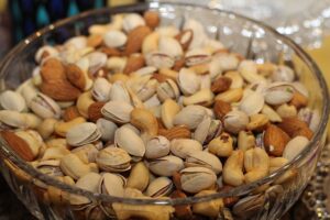 Which are the side effects of Overeating Nuts